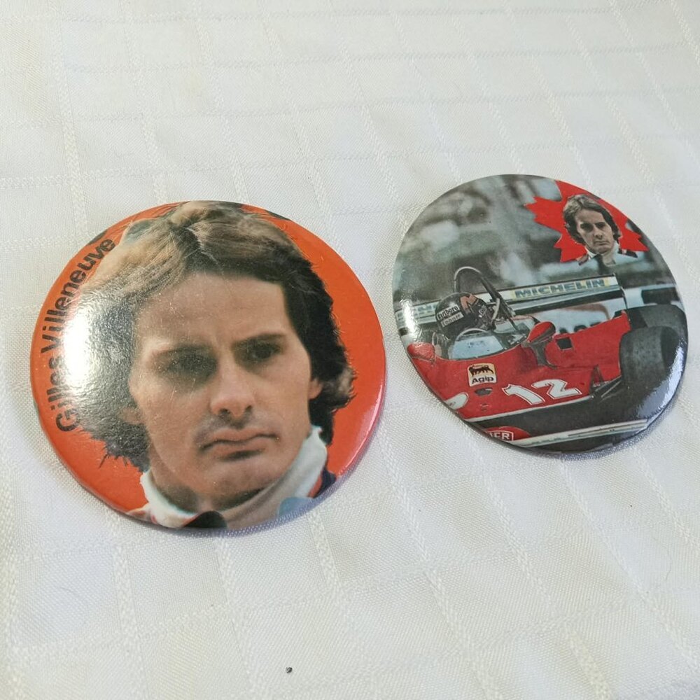 Two strange & unusual vintage button pins featuring Gilles Villeneuve
